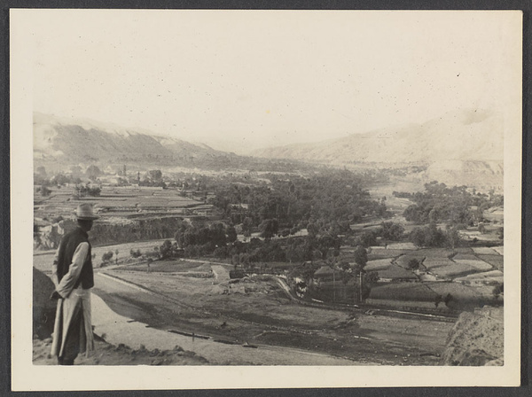 Tsinghai or Koko Nor.  Looking up the Ch'uan K'o Valley, a Moslem stronghold, toward Payung Rung.  Mr. Harris in foreground.