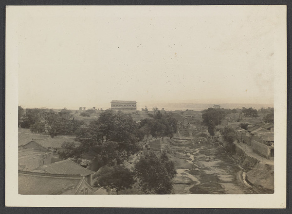 Westward ho.  City of Tungkuan from train looking toward North Gate & Yellow R.