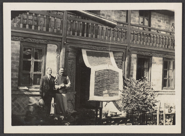 Sining, capital of Tsinghai or Koko Nor. Dr. Z. & Mr. Learner in front of the Learner home.
