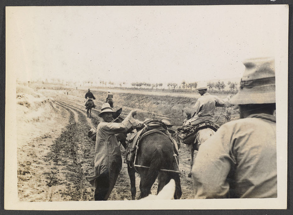 Sining, capital of Tsinghai or Koko Nor.  East end of Sining Valley; 30 li to the city.  Mr. Mann & Dr. Z. ahead.  Mr. Learner & Harris behind.