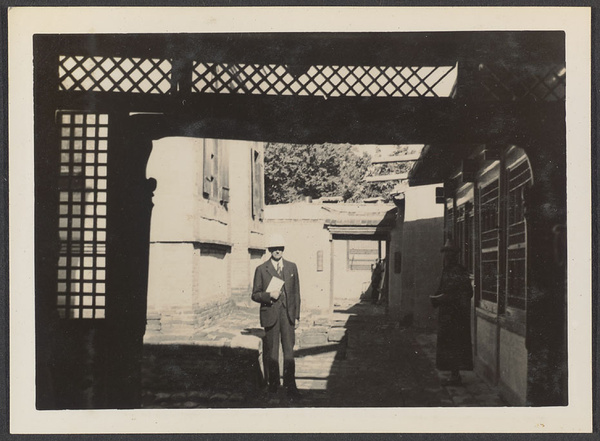 Sining, capital of Tsinghai or Koko Nor. Entrance to C.I.M. compound - Sining church on left, guest hall on right.