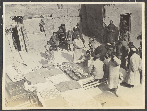 Shunhwa. Moslem wedding next to Holton's home. Taken from roof. Display of goods given by both the bride's and bridegroom's home to the newlyweds. Note number of pairs of shoes. Feb. 1932.