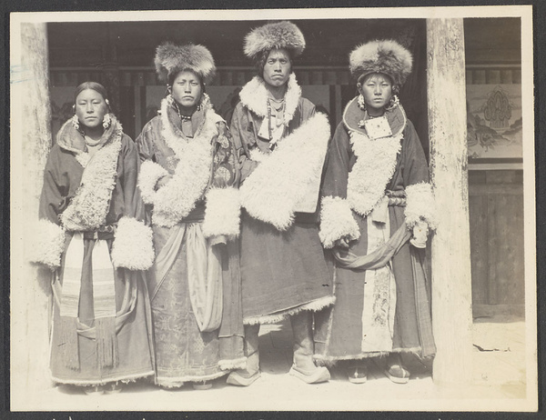 Pientu Monastery. 3 girls and 1 man from nearby villages in all their finery.