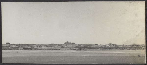 Tung Hsin Ch'en alias Pang Ko Ch'en (Half-a-town). Tung Hsin Chen from across the river. A mosque dominates the hill.
