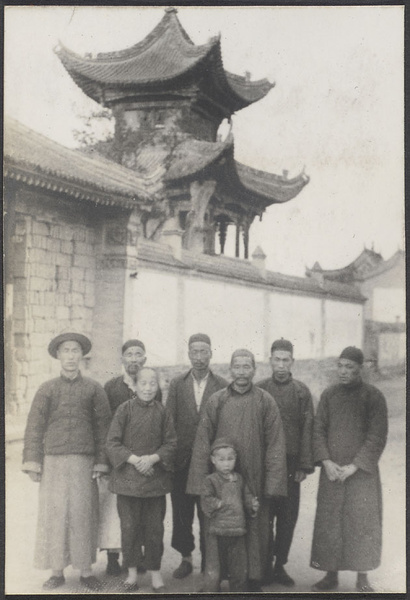 Kuyuan, Kansu. S.A.M. station. Group of Christians. Tower of mission compound.