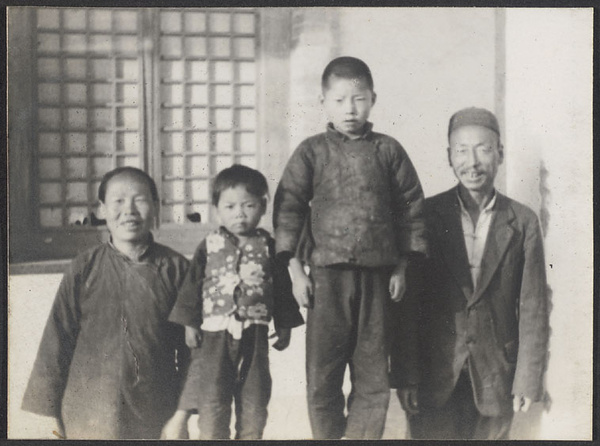 Kuyuan, Kansu. S.A.M. station. The major domo and family.