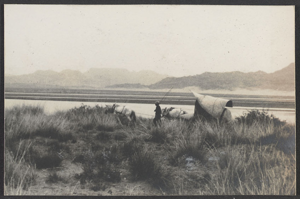 Crossing an arm of the Gobi, the Alashan Desert. The Yin Mountains of the Odos Desert across the Yellow River from us.