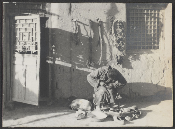Around Lin Ho, Suiyuan. Any old shoes to mend.
