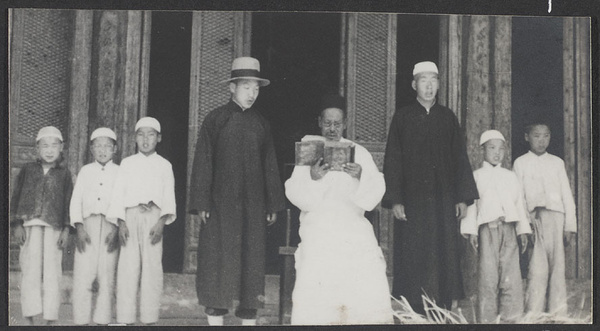 Outside Ningsia. Reading to a few disciples.