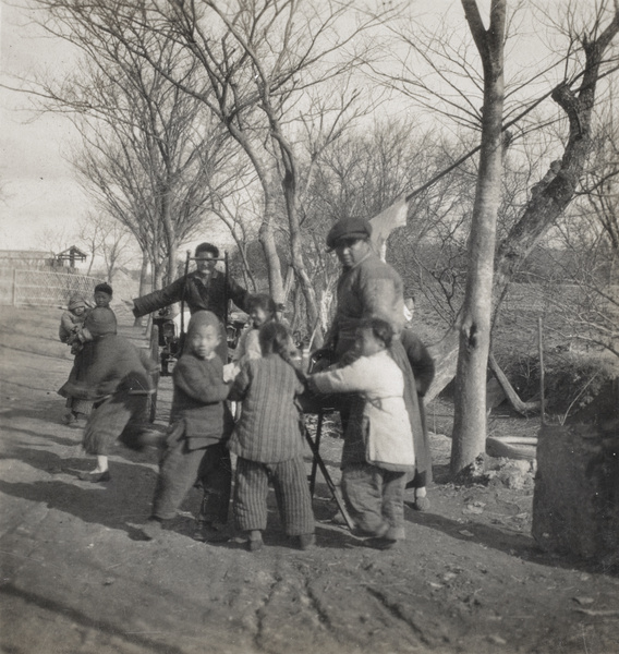 Children by a roadside stall, Shanghai