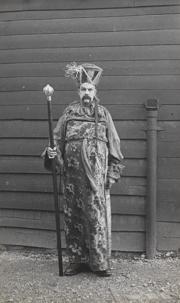 A man dressed as a Chinese Giant, Eastleigh Carnival, Hampshire, England