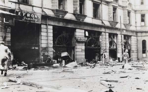 Debris outside the Palace Hotel, Nanking Road, Shanghai, after the bombing on 14 August 1937