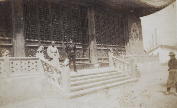 Buddhist monk and a SMP policeman at the Jade Buddha Temple (玉佛禅寺), Shanghai