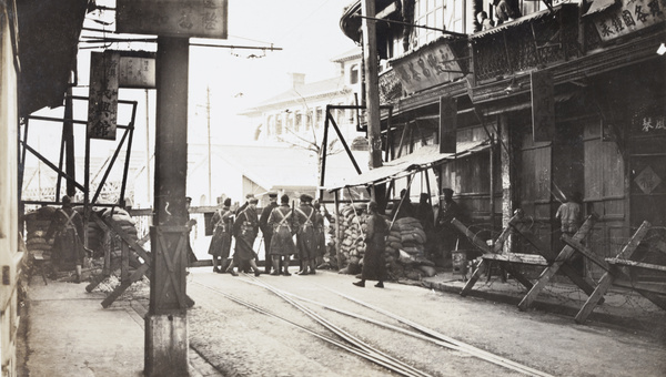 Soldiers at a barricade and guard post, Shanghai