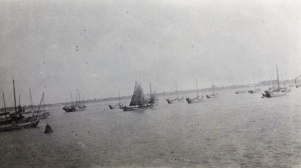 Boats and a buoy on the River Huangpu, Shanghai