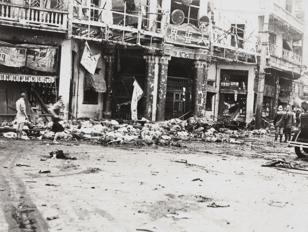 Aftermath of bombing, Avenue Edward VII and Yu Ya Ching Road, Shanghai, 14 August 1937