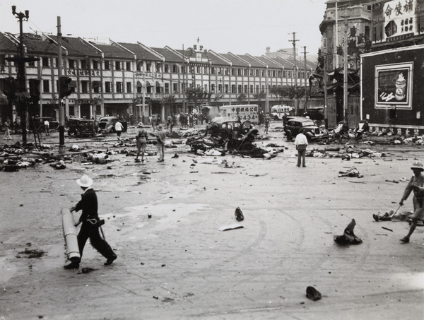 Aftermath of bombing, Avenue Edward VII and Yu Ya Ching Road, Shanghai, 14 August 1937