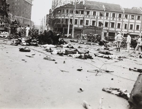 Aftermath of bombing, Avenue Edward VII and Yu Ya Ching Road, Shanghai, 14 August 1937