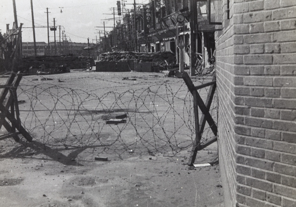 Street view from blockhouse at junction of Boundary Road and North Honan Road, Shanghai, 1937