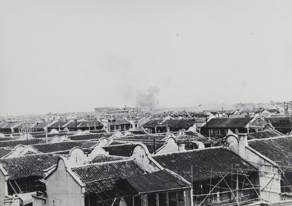 Smoke rising after a bomb or shell explosion, Shanghai, 1937