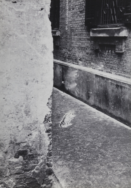 Shell damage on a walkway, Shanghai, 1937