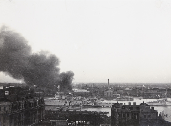 Smoke from Pudong fire billowing up behind USS Augusta, Shanghai, 1937