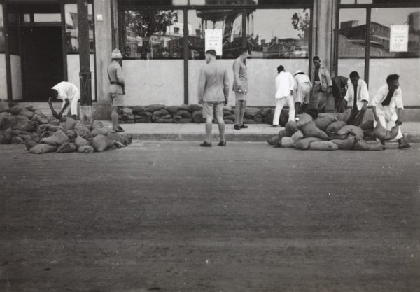 Sandbagging Embankment House, Shanghai, 1937