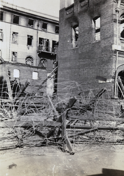 Barbed wire barricade at the corner of Range Road and North Kiangse Road, Shanghai, October 1937