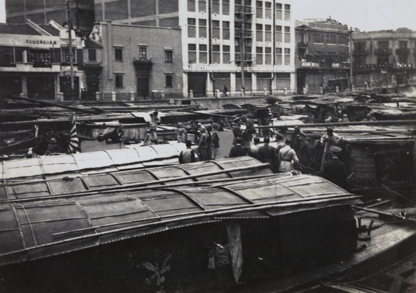 Representatives of British, American, French, and Japanese military in negotiation, Soochow Creek, Shanghai, October 1937