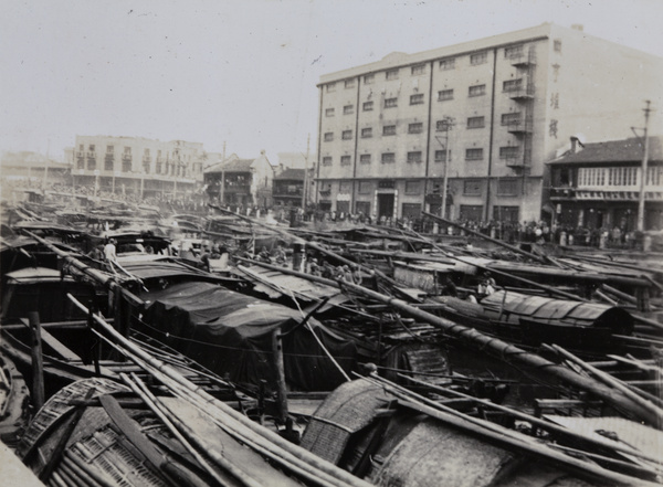 Japanese marines navigating through massed Chinese boats, Soochow Creek, Shanghai, October 1937