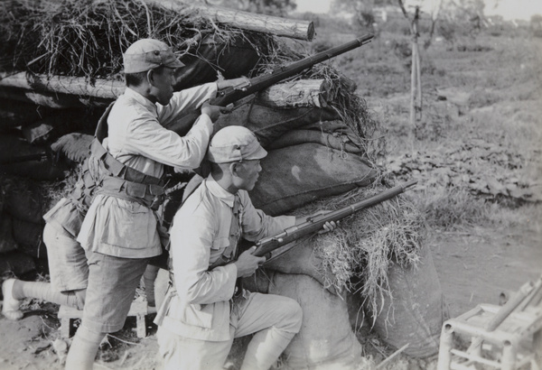 Chinese soldiers with Hanyang 88 shotguns at a guard post near Hungjao, Shanghai, 1937