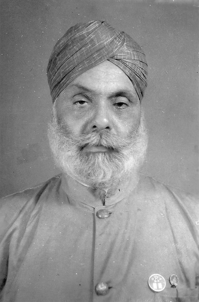 Kartar Singh Sangha in his Chinese Maritime Customs Service uniform, with official badges