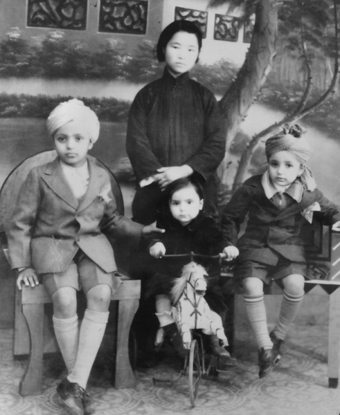 Harbhajan Singh Sangha, Mohinder Kaur Sangha, Ranjit Singh Sangha, with their amah, Shanghai