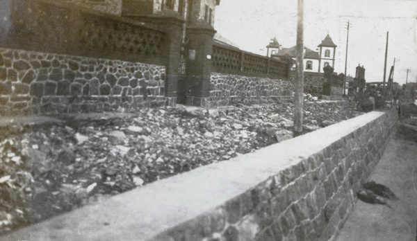 Retaining wall, by beach, Chefoo