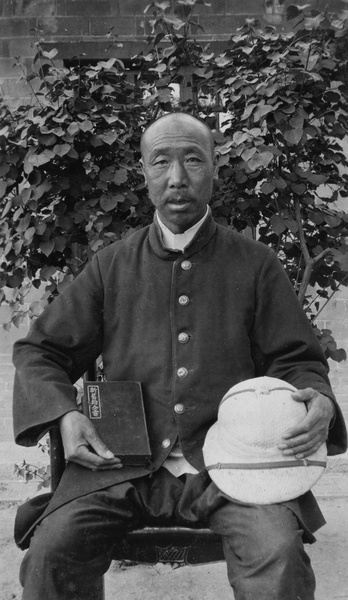 Portrait of a bible colporteur, with sun hat