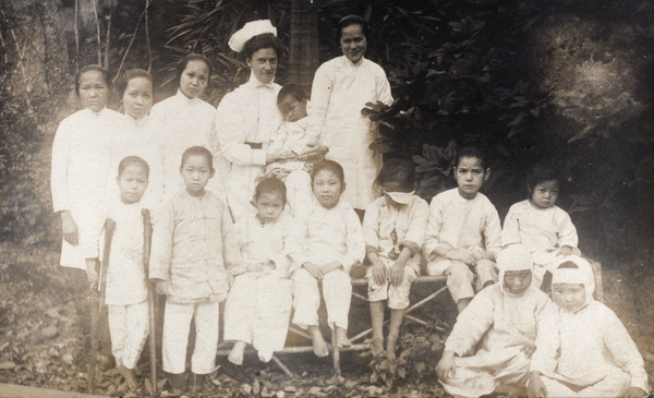 Dr Eleanor Whitworth Mitchell, with hospital staff and patients, Hong Kong