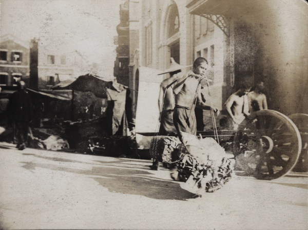 Porters and a cart, Hong Kong