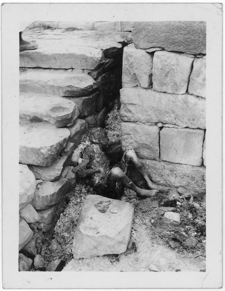 Charred remains of a child, Chongqing, after bombing