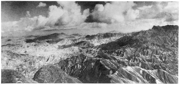 Dramatic aerial view of mountains and clouds