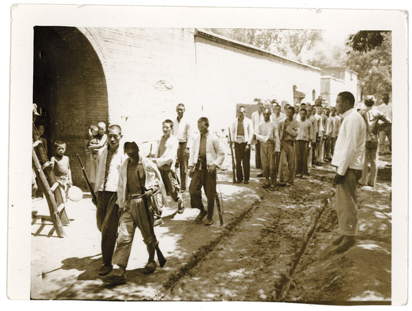 Village self-defence corps, armed with old muskets