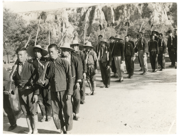 Village self-defence unit (militia) , armed with guns, spears and hand grenades, South Shanxi, 1939