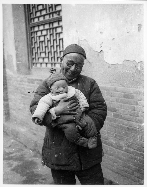 Professor Yulibuzhang holding Erica Lindsay