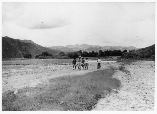 A stretcher party carrying a wounded soldier to Dr. Norman Bethune's hospital