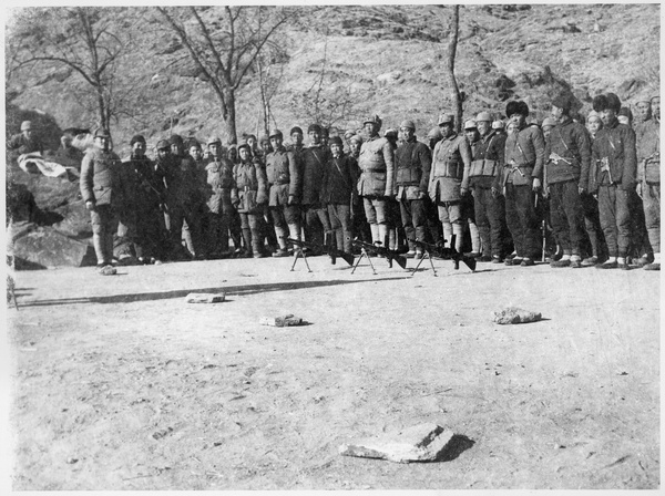 Gathering of militia, with three ZB-26 light machine guns on the ground in front of them, Jinchaji