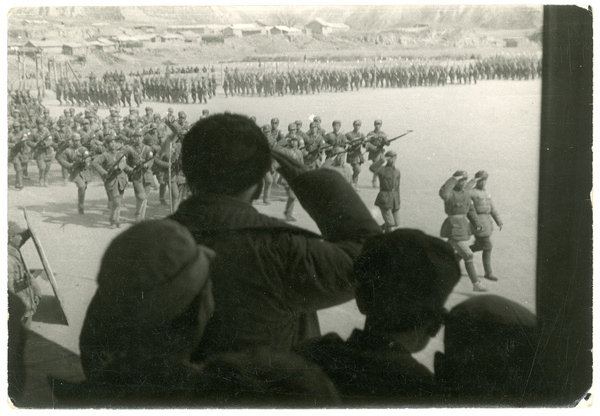 Lin Boqu (林伯渠), Chairman of the Shaanxi-Gansu-Ningxia Border Region (陕甘宁边区), reviewing troops, Yan'an (延安)