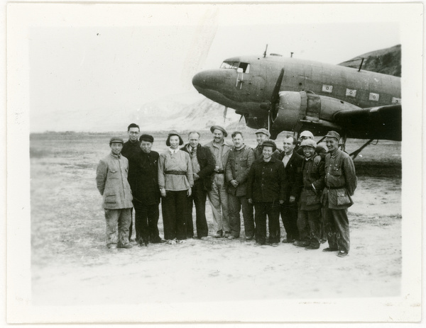 A group of Chinese and foreigners next to a Douglas C-47 Skytrain (Dakota), Yan'an (延安)