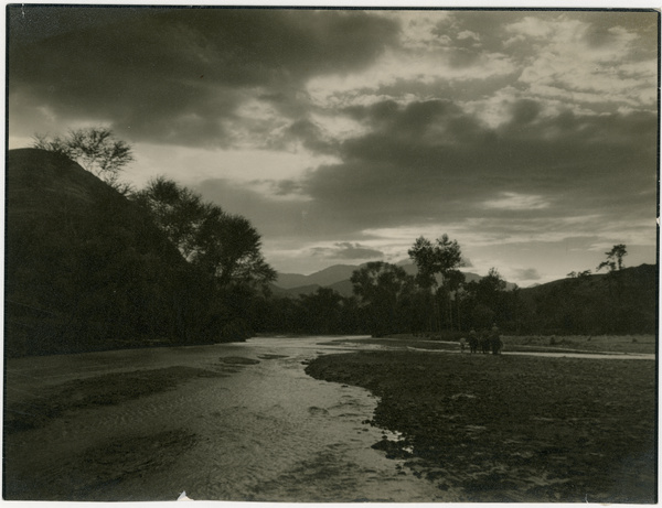 Evening clouds over people on horseback beside the Sha River, Hebei