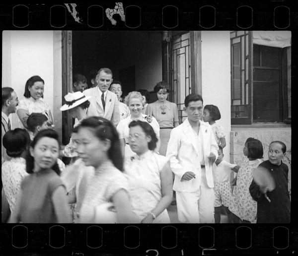 Wedding guests, including Dr John Leighton Stuart, emerging from the venue, Yenching University (燕京大學), Beijing (北京)