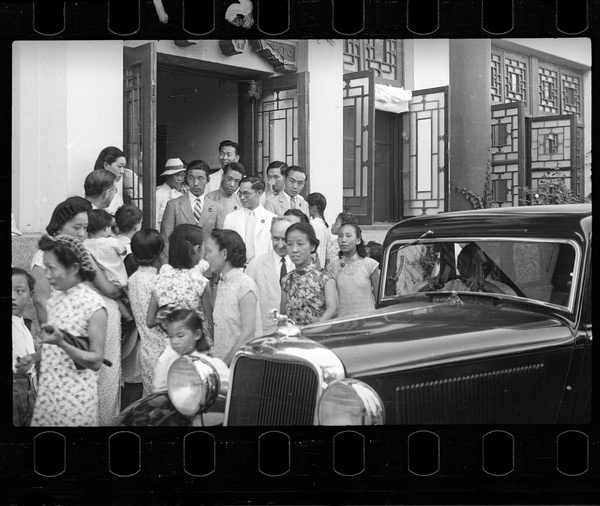 Wedding guests emerging from the venue, by a Dodge Brothers sedan car, Yenching University (燕京大學), Beijing (北京)