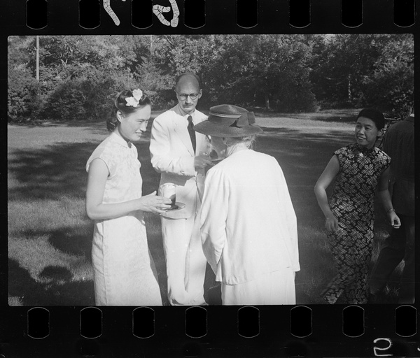 Hsiao Li Lindsay (李效黎) and Michael Lindsay (林迈可) with a guest, at their wedding party at Yenching University (燕京大學), Beijing (北京)